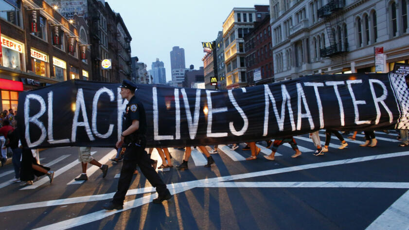 A photo of a Black Lives Matter banner