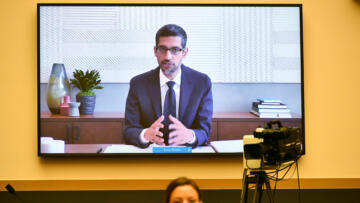 An image of Sundar Pichai on a screen during the House Judiciary Committee hearing on Antitrust Law