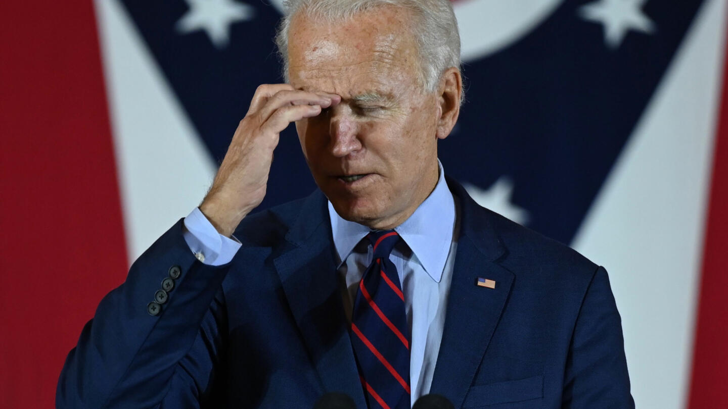 A photo of 2020 Presidential Candidate, Joe Biden, almost face palming