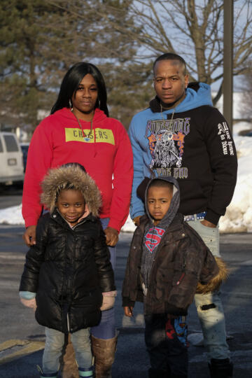 A photo of Johnathan King with Brianna Hernandez and their two children.