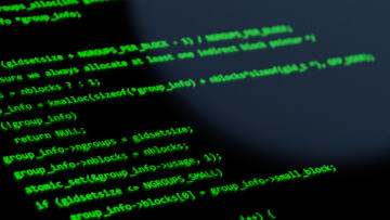 Close-up of computer screen displaying some programming code language
