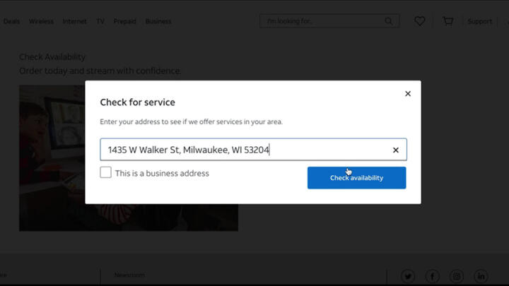 An address is entered into a search bar on AT&T's website.