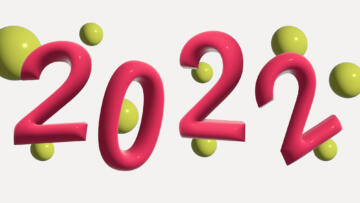 3-D illustration of the number 2022 in pink, with yellow balls floating in the background.