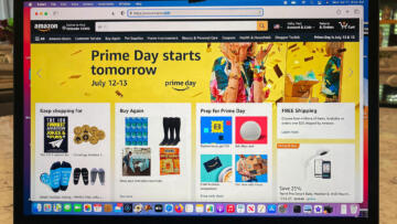 Photograph of a laptop screen showing the Amazon homepage, featuring a banner that says “Prime Day starts tomorrow.”