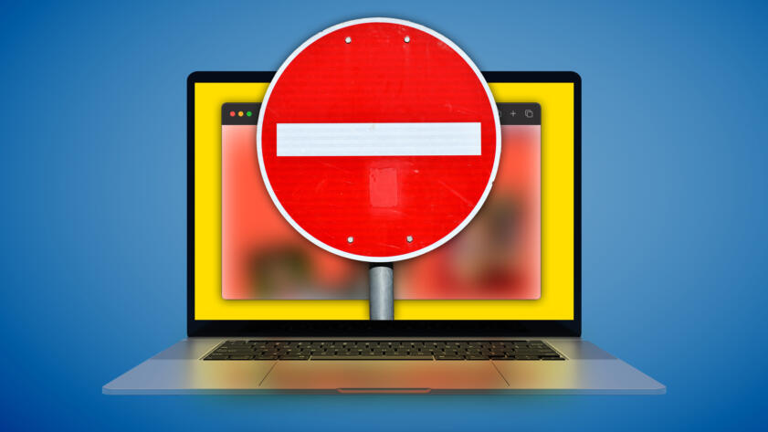 Photo illustration of an open laptop showing a blurred browser window; an enlarged sign of a red circle with a white line is obscuring the browser window and sticking out of the laptop screen